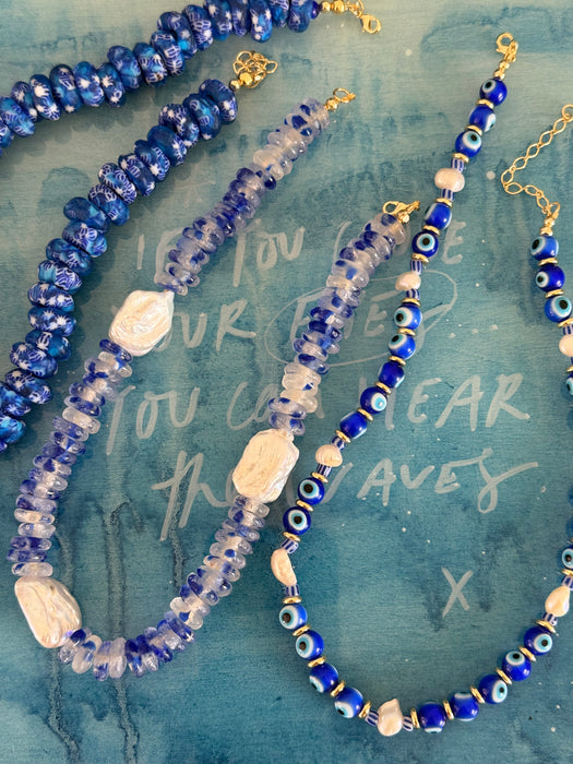 She moves like water Necklace